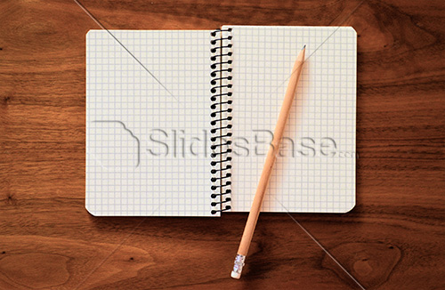 notebook-pencil-paper-checkered-woodesk-desk-stock